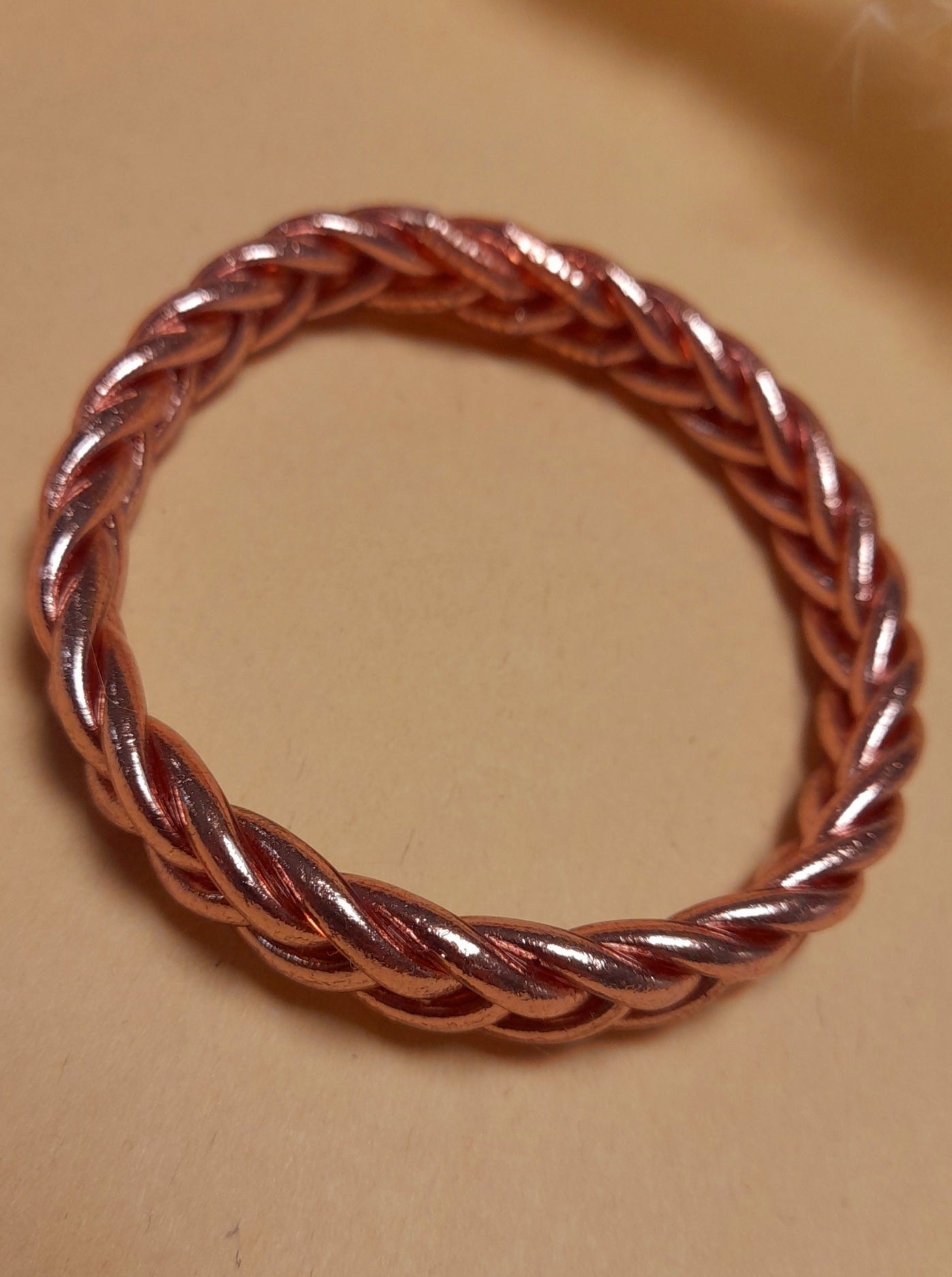 Jonc Bouddhiste tressé Rose Gold avec mantra taille L