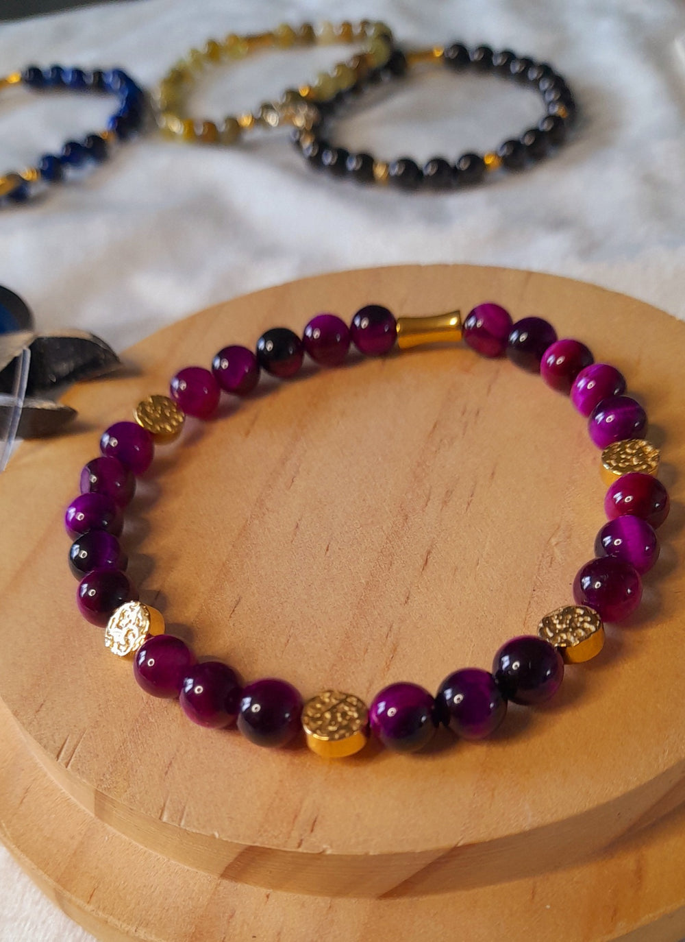 Bracelet pierre Œil de tigre rose.